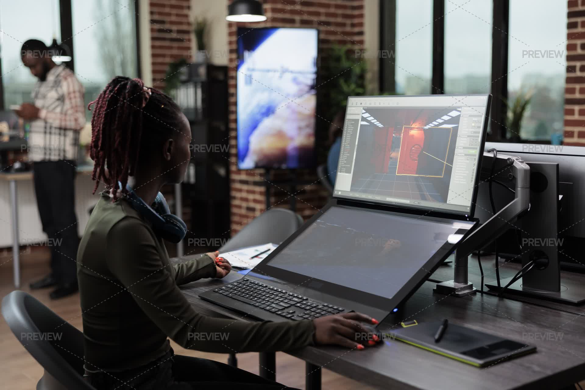 Games Developer Booth Game Developer Designing Game Level - Stock Photos | Motion Array