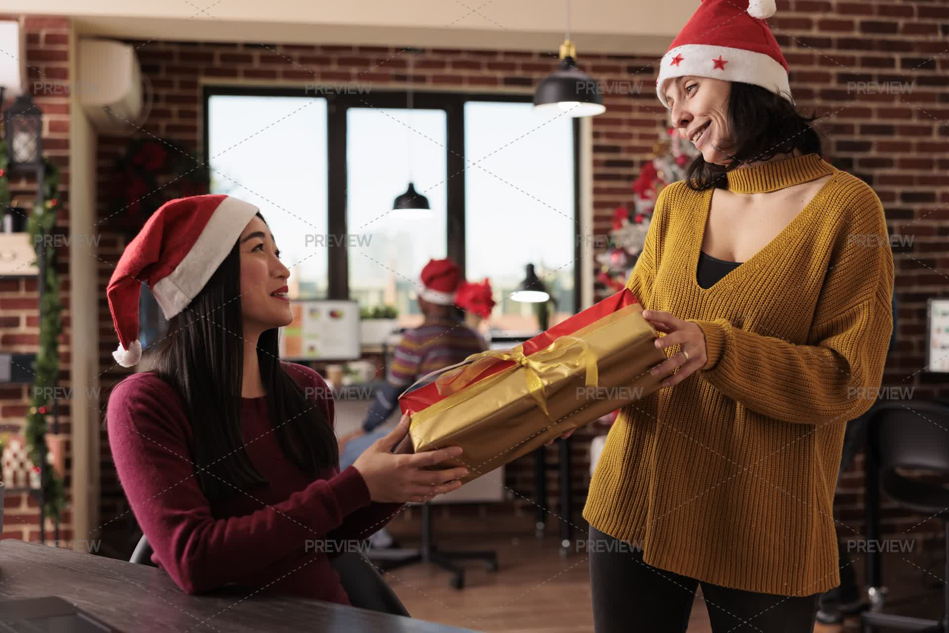 Change Gift Women Exchanging Gifts On Christmas Eve - Stock Photos | Motion Array