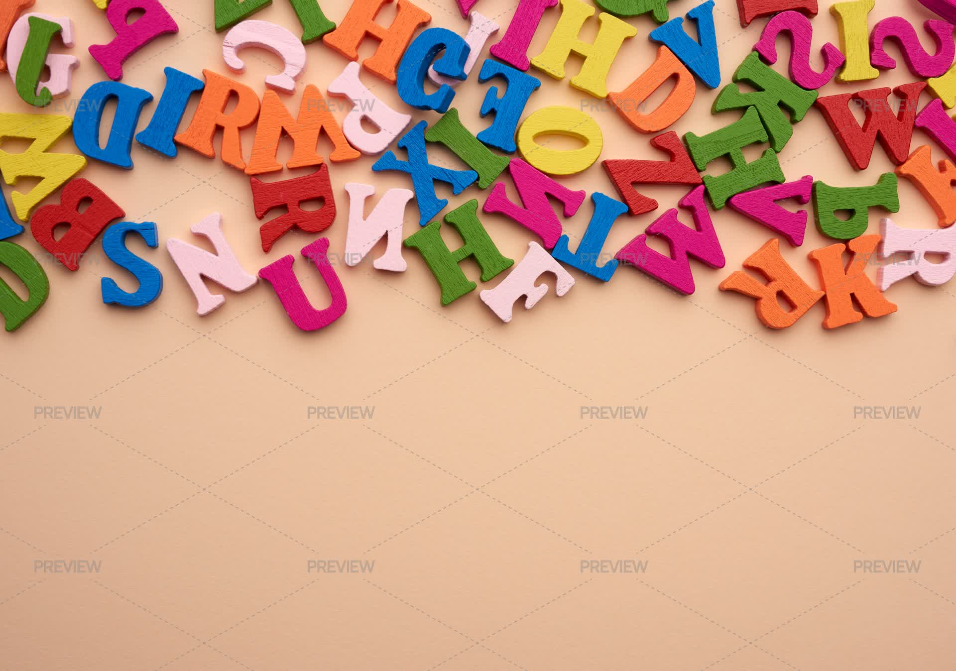 Multi-colored Wooden Letters Background - Stock Photos | Motion Array