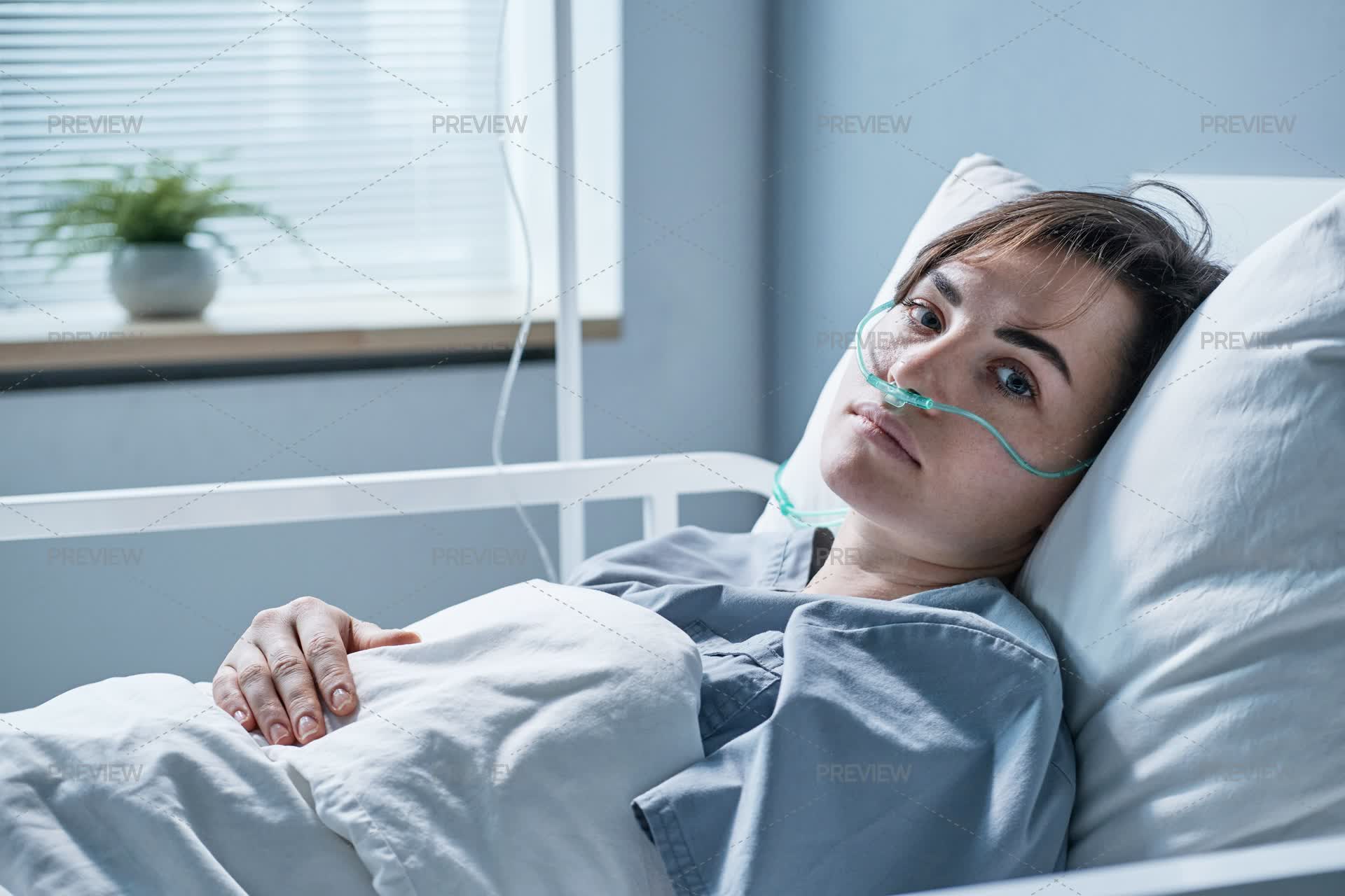 A Sick Woman In A Hospital - Stock Photos | Motion Array