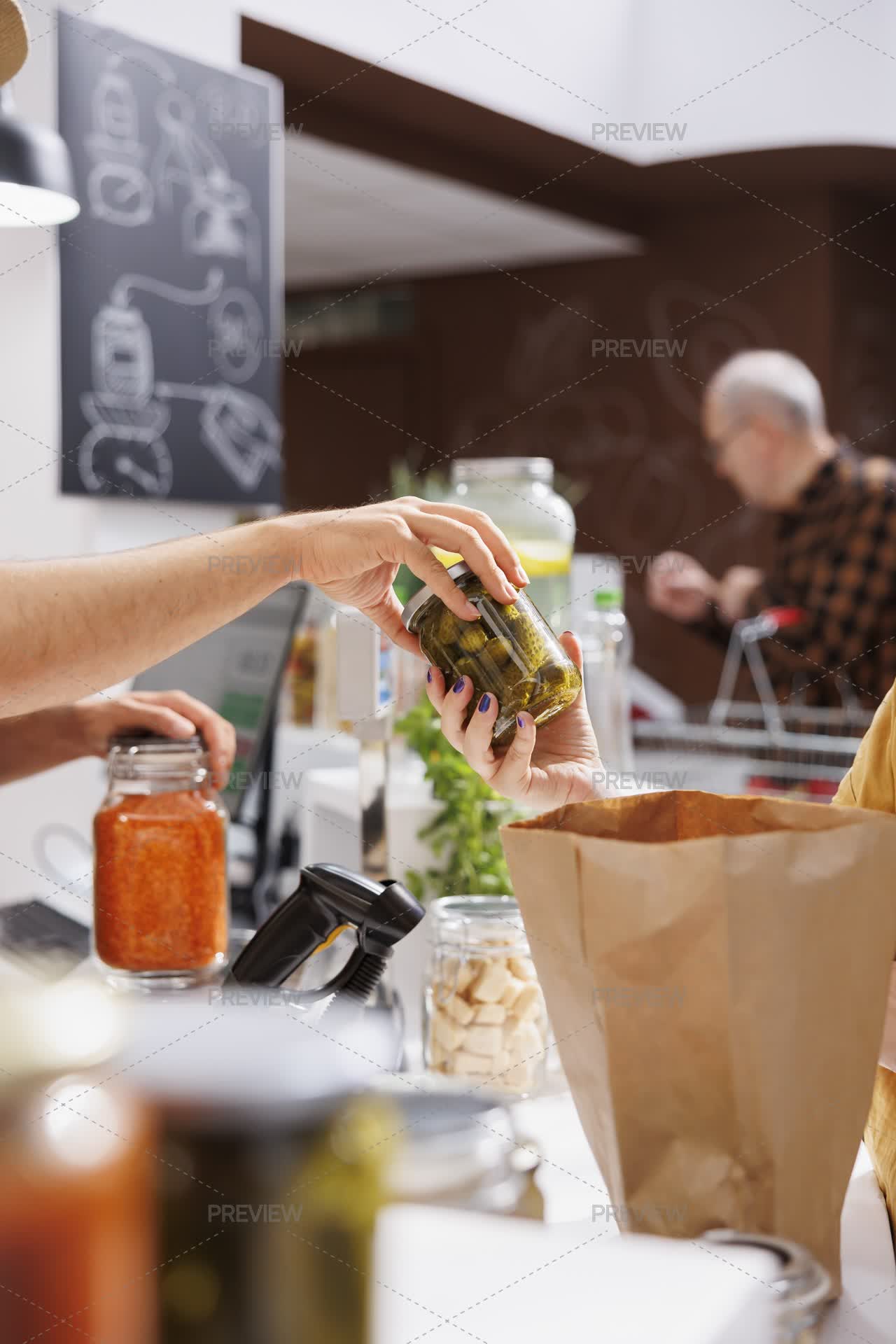 Client At Local Zero Waste Shop Checkout - Stock Photos | Motion Array