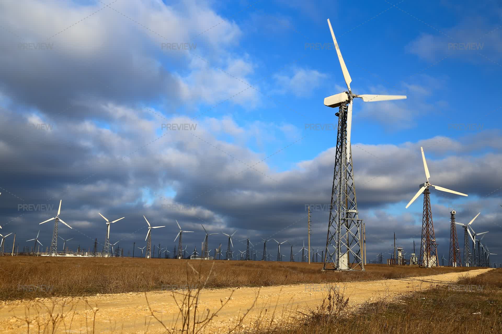 Wind Turbines In Spring Field - Stock Photos | Motion Array