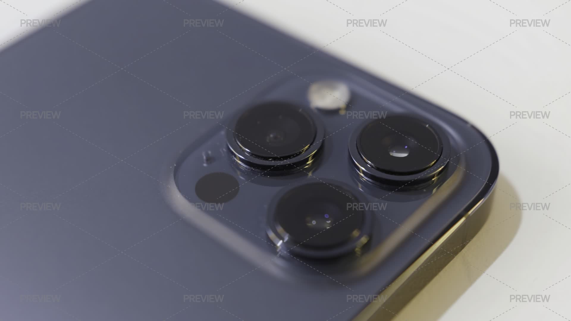 Close Up Details Of A Beautiful Dark Blue Smartphone With Three Cameras ...