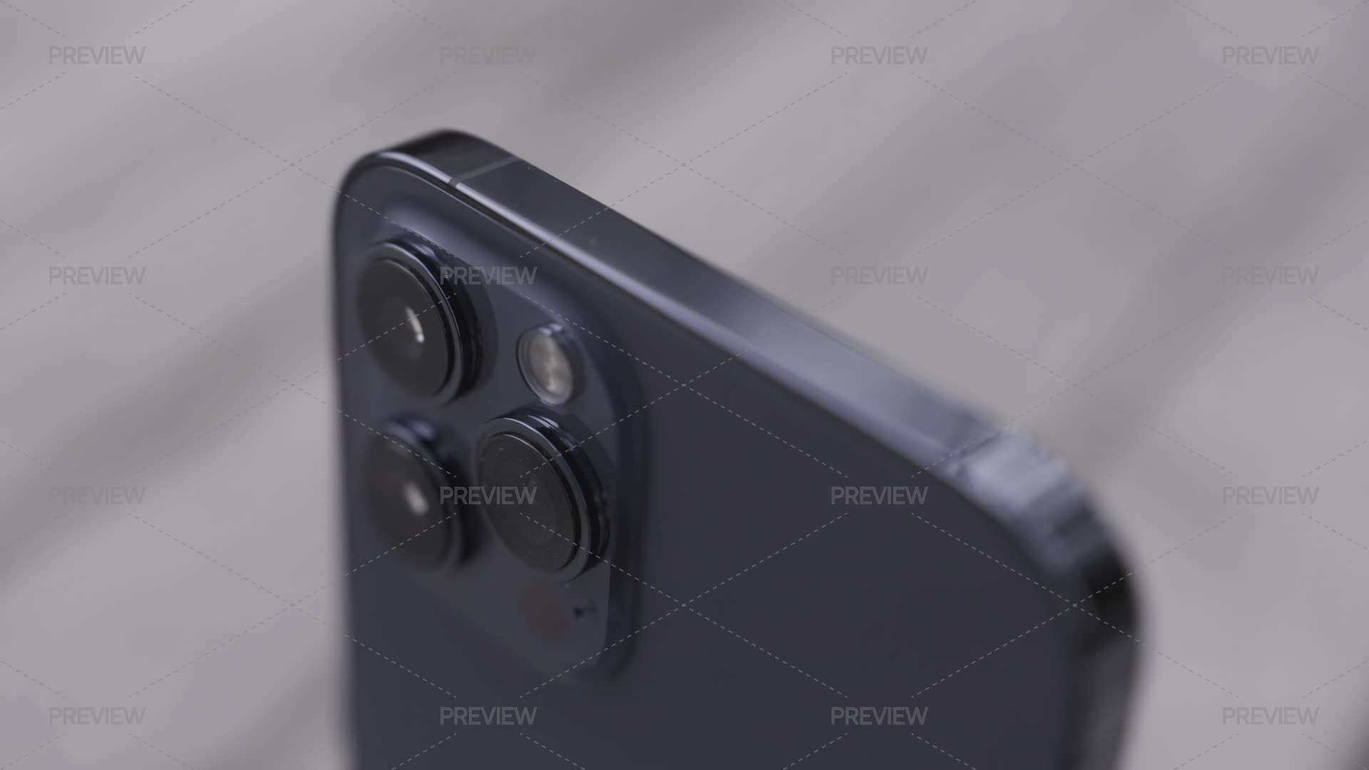 Close Up Details Of A Beautiful Dark Blue Smartphone With Three Cameras ...