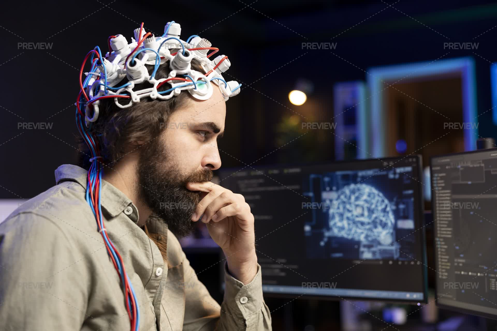 Programmer Using Eeg Headset To Upload His Mind Into Computer - Stock ...