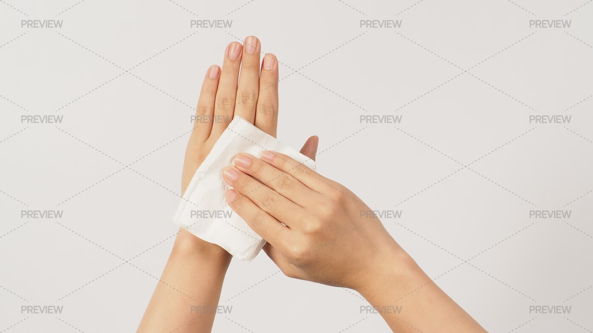 The Hand Is Holding Tissue Paper And Wip - Stock Photos | Motion Array