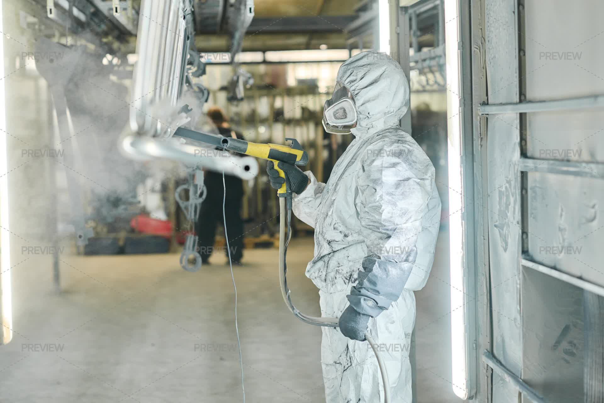 Worker Of Modern Factory Painting Machine - Stock Photos | Motion Array