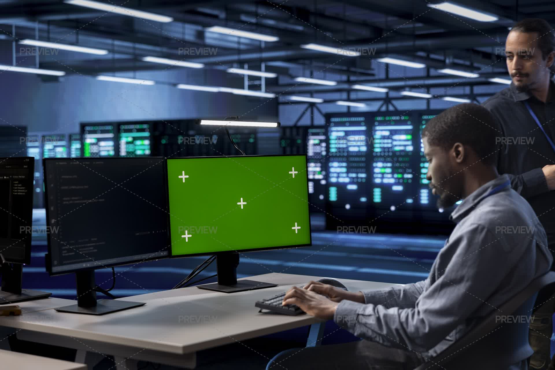 Engineer In Server Hub Using Green Screen Computer To Find ...