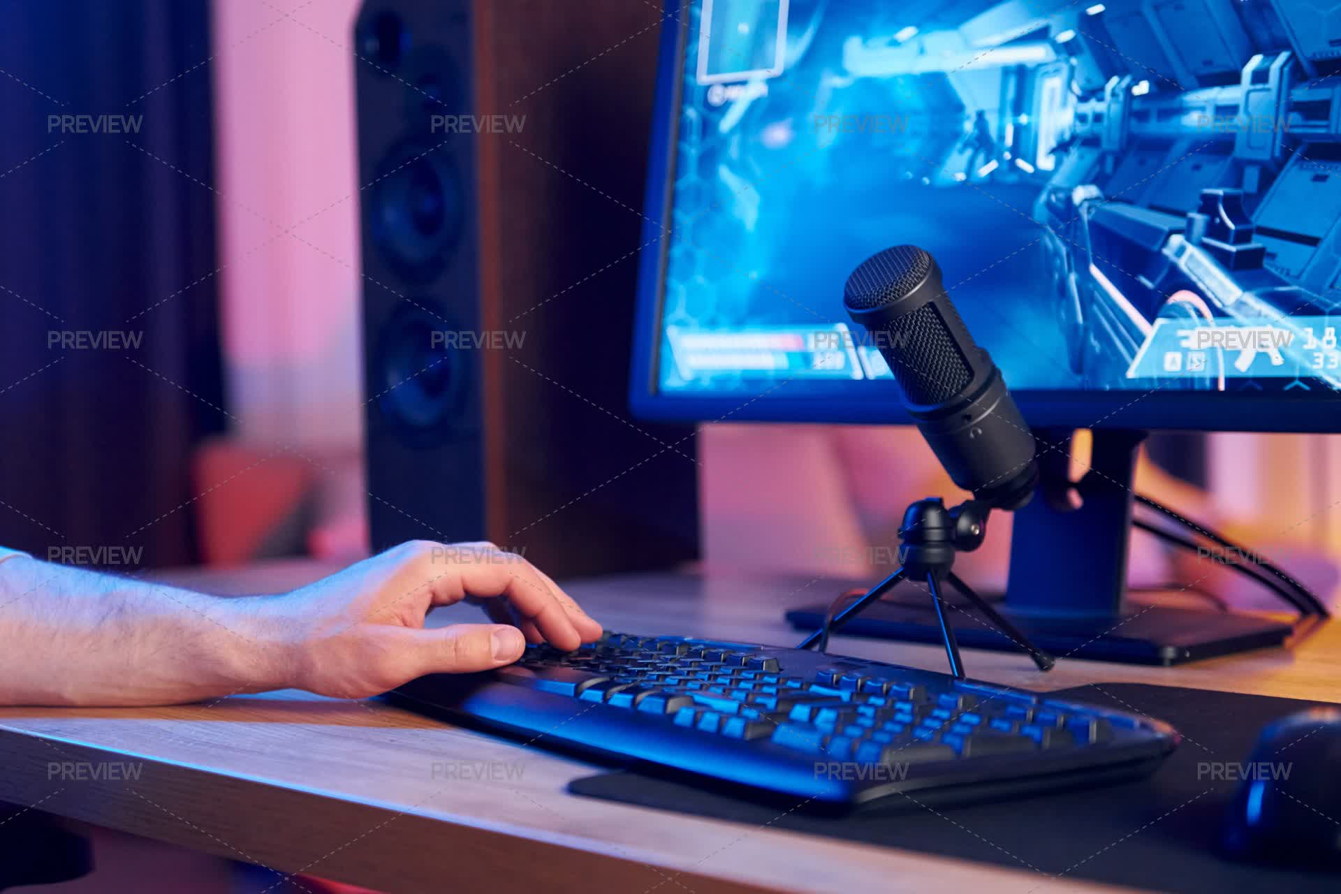 Online Streamer Playing FPS Shooter Game Using Keyboard At Home - Stock ...