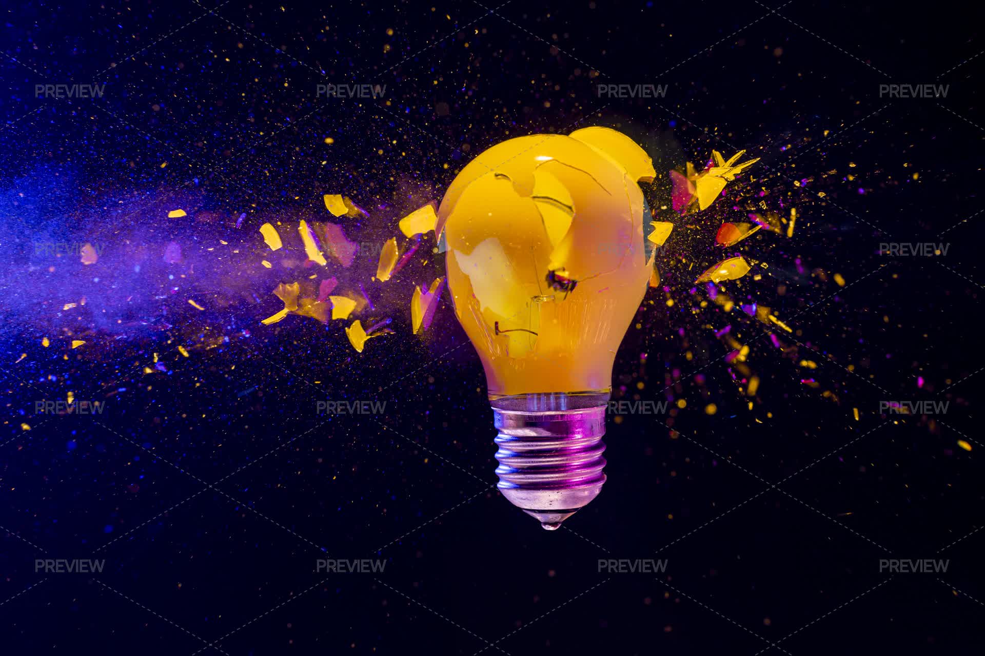 Yellow Light Bulb Exploding - Stock Photos | Motion Array