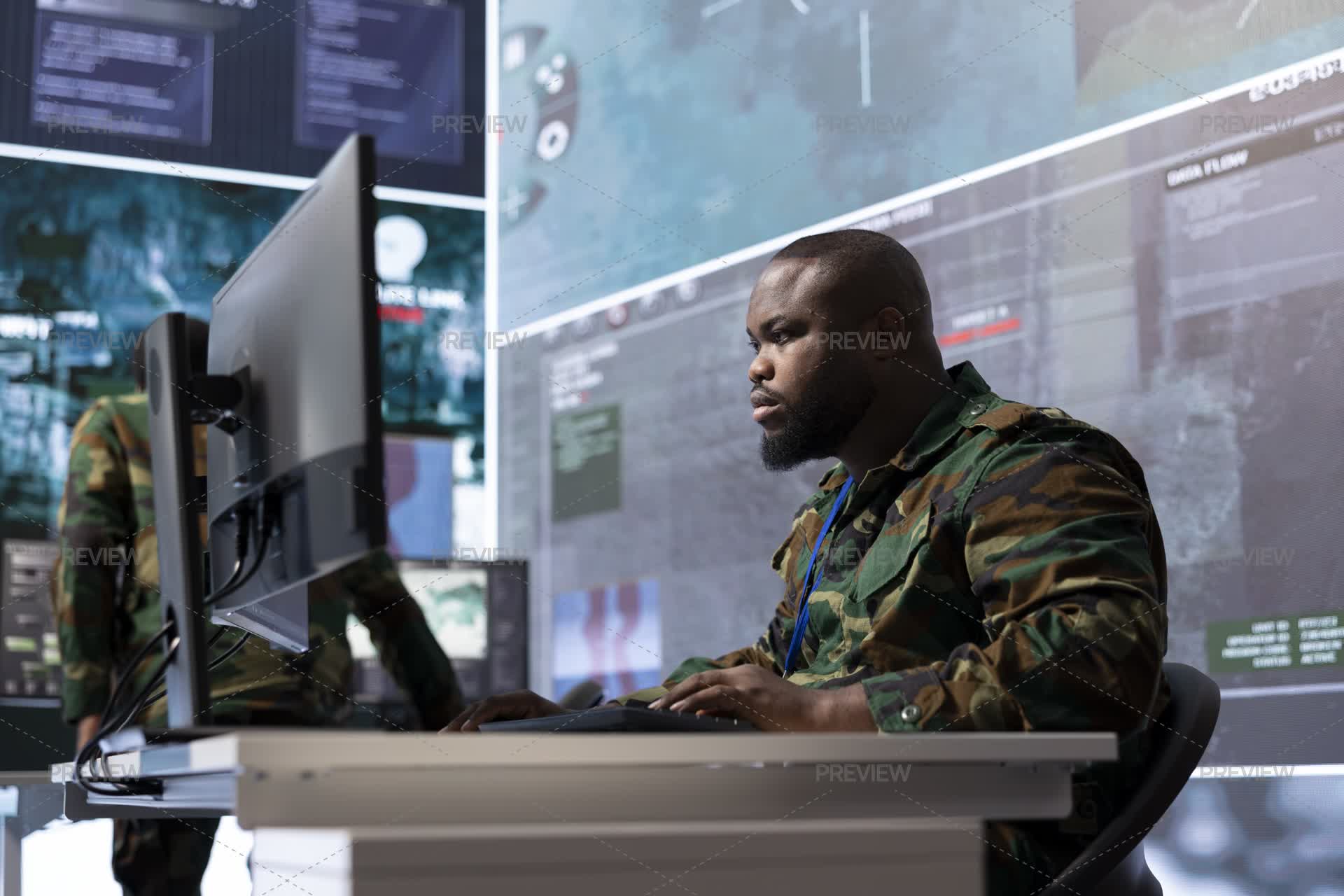 Military Expert In An Advanced Operations Center Oversees Satellite ...