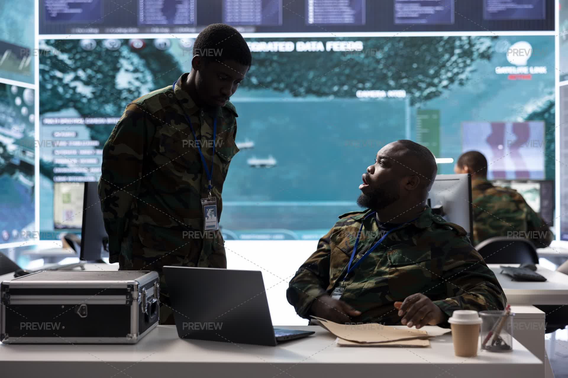 Soldiers Examining Real Time Satellite Data And Details From Old ...