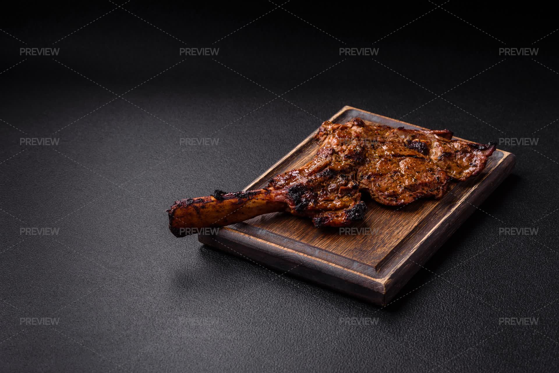 Juicy Beef Tomahawk Steak On The Bone Ba - Stock Photos | Motion Array