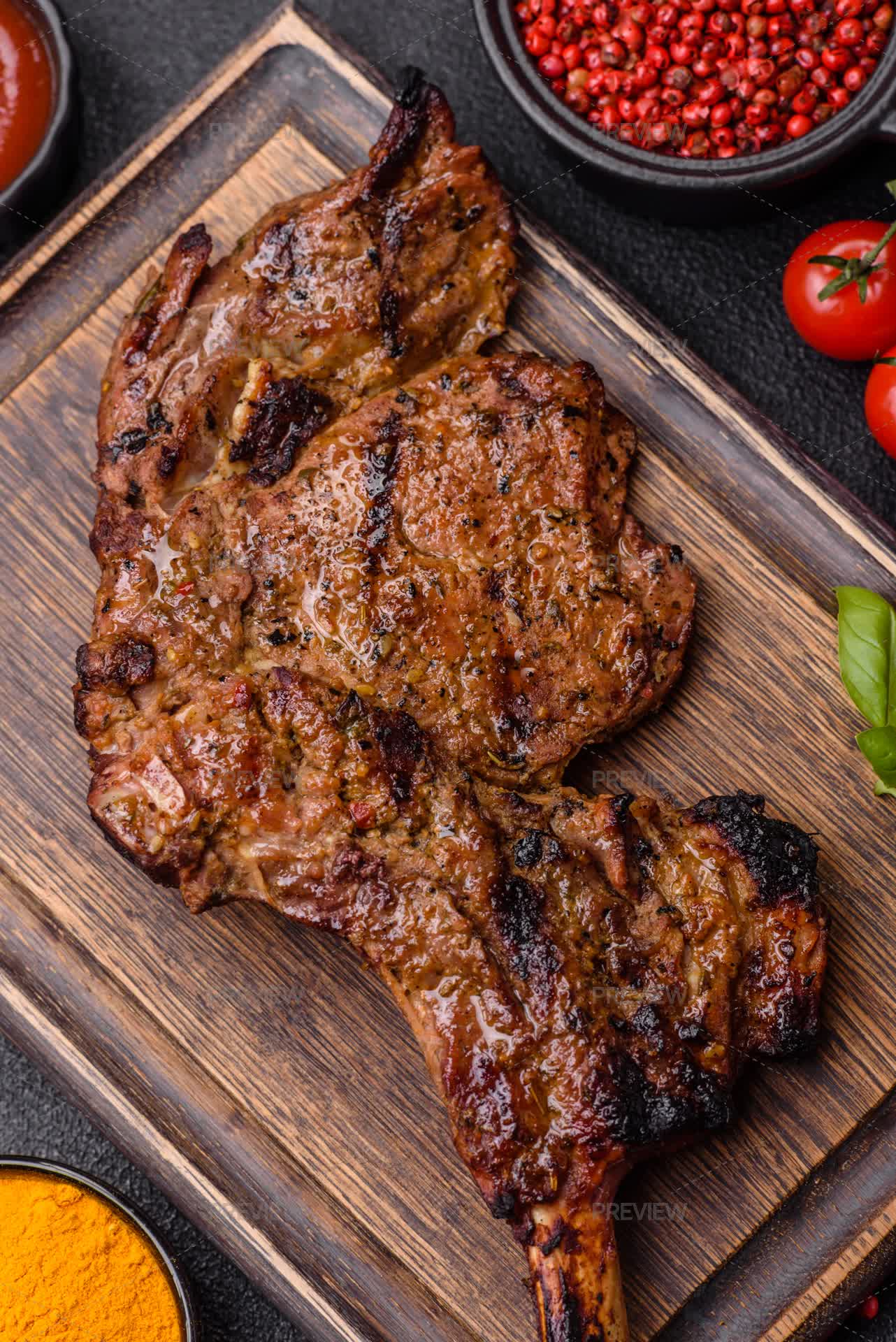 Juicy Beef Tomahawk Steak On The Bone Ba - Stock Photos | Motion Array
