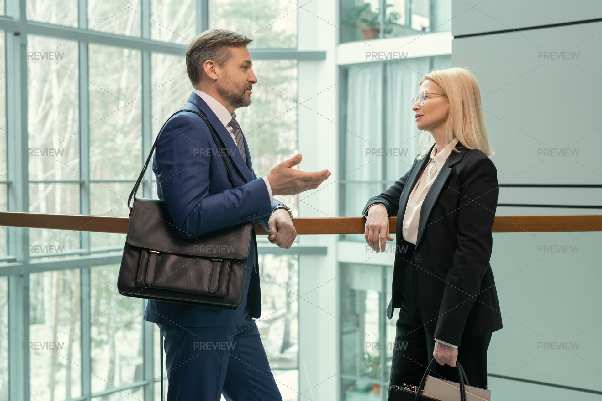 Business Colleagues Talking At The Office - Stock Photos | Motion Array