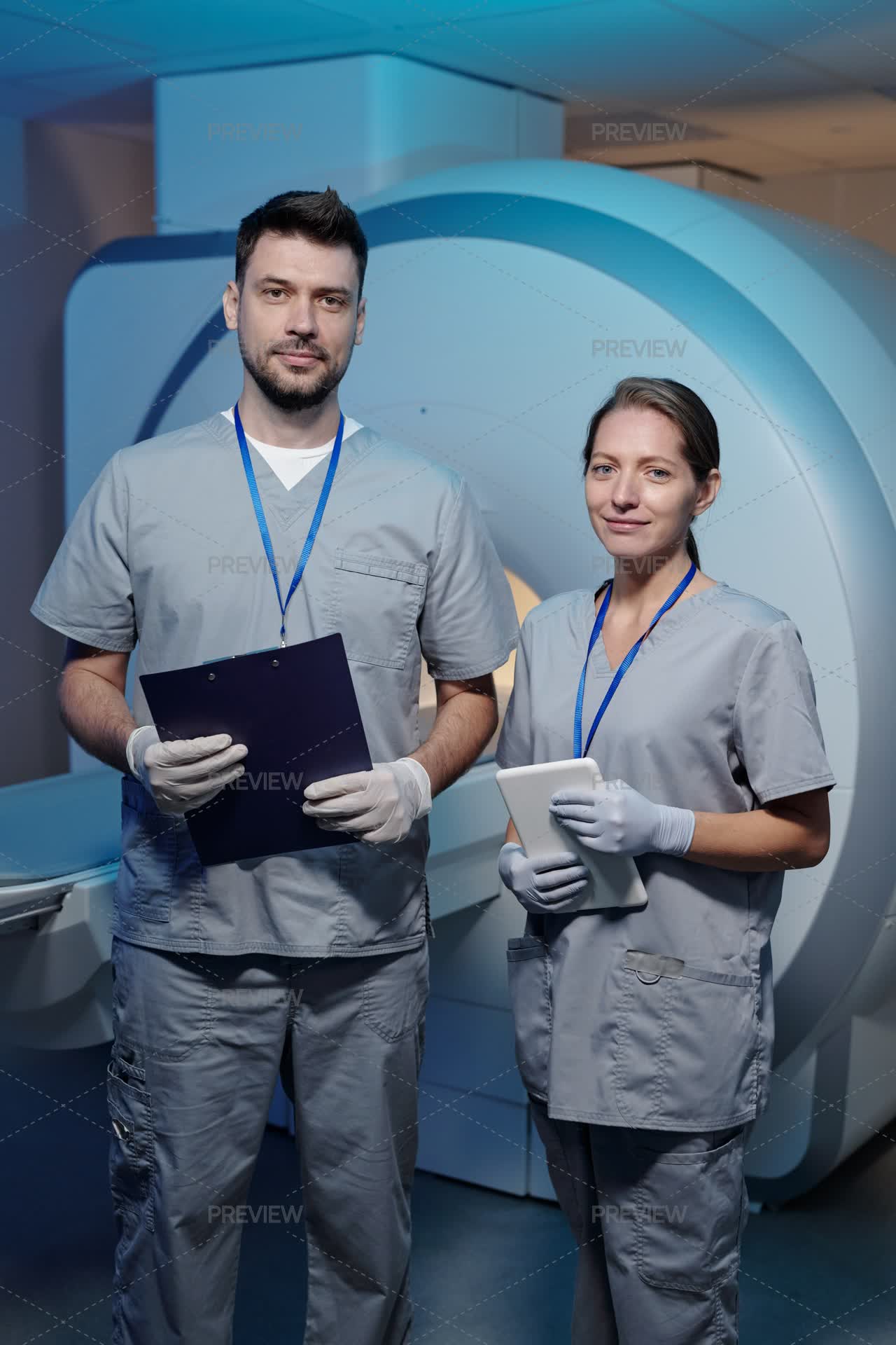 Shant Radiographer Female Clinician And Male Radiographer In Uniform Standing Against The ...