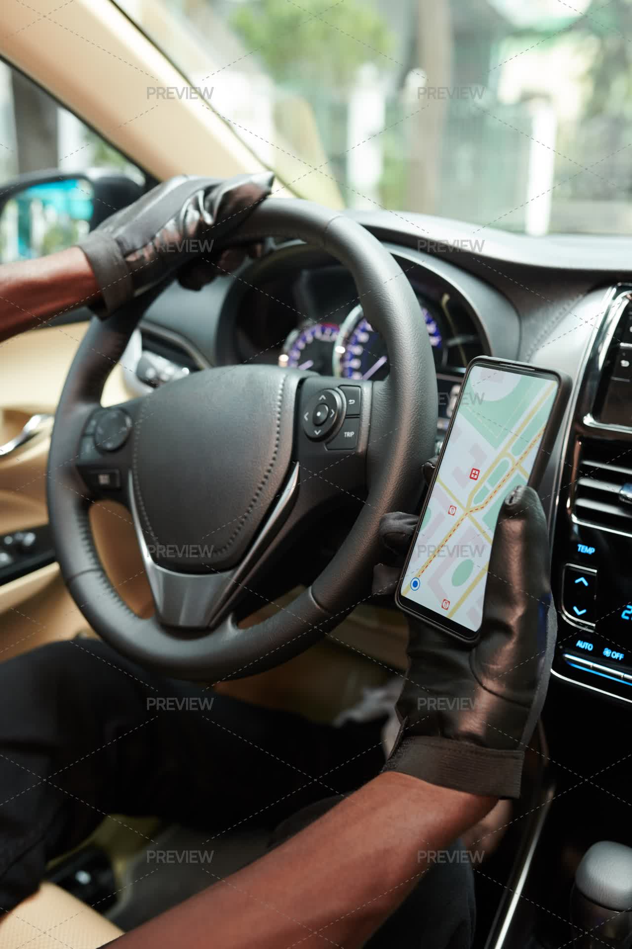 Checvking A Rmap Driver Checking Map On Smartphone - Stock Photos | Motion Array