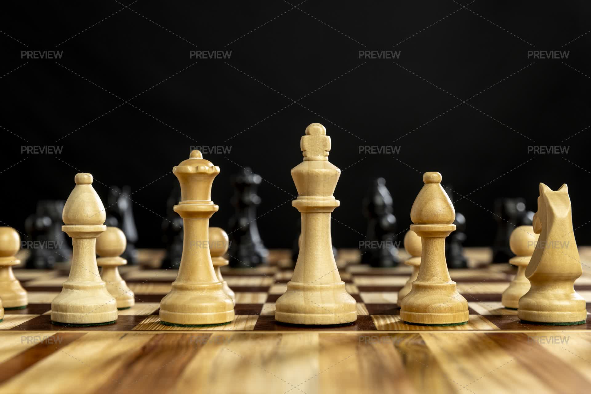 Chess Pieces On Wooden Chessboard - Stock Photos | Motion Array