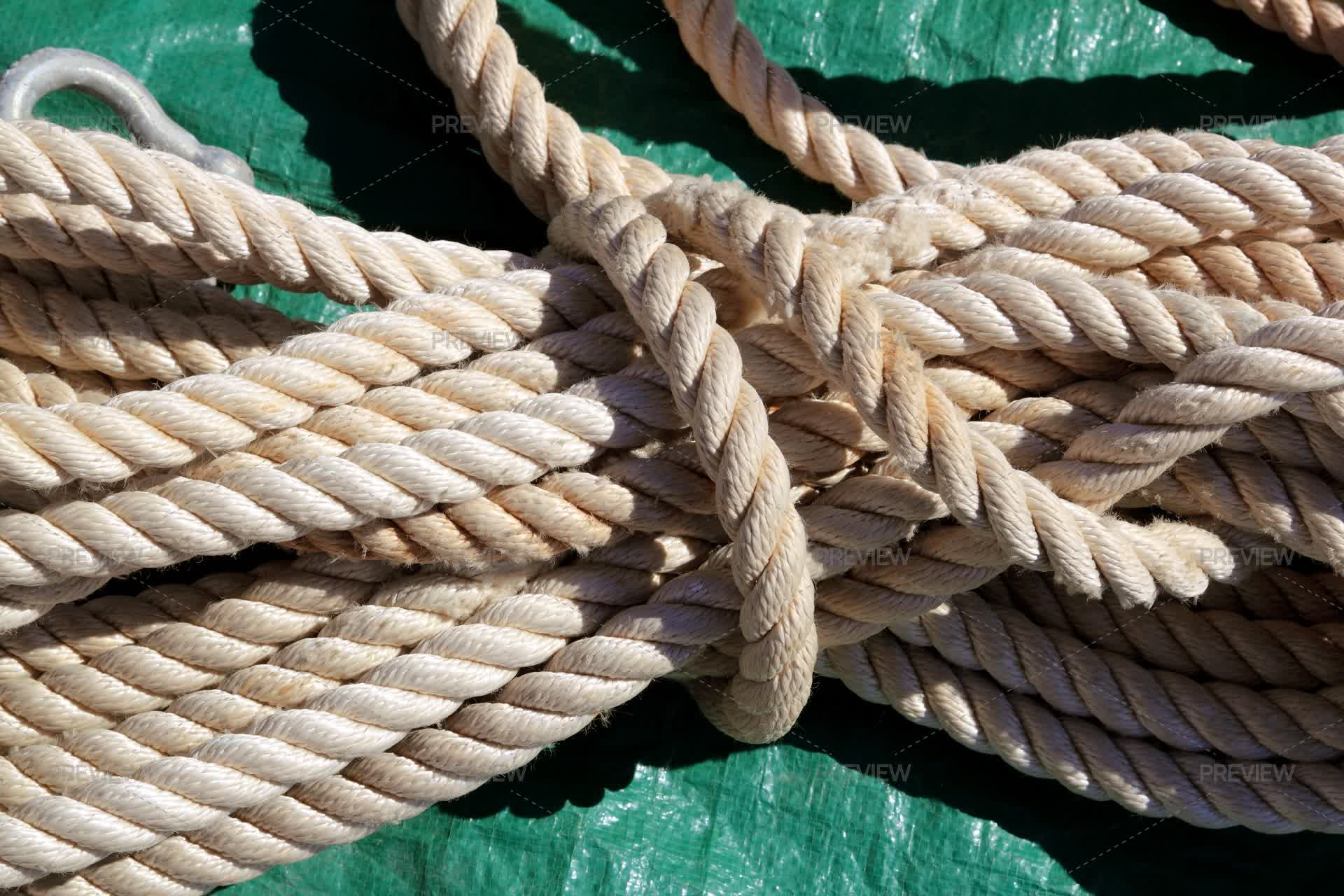 White Rope On A Green Tarp Background Texture - Stock Photos | Motion Array