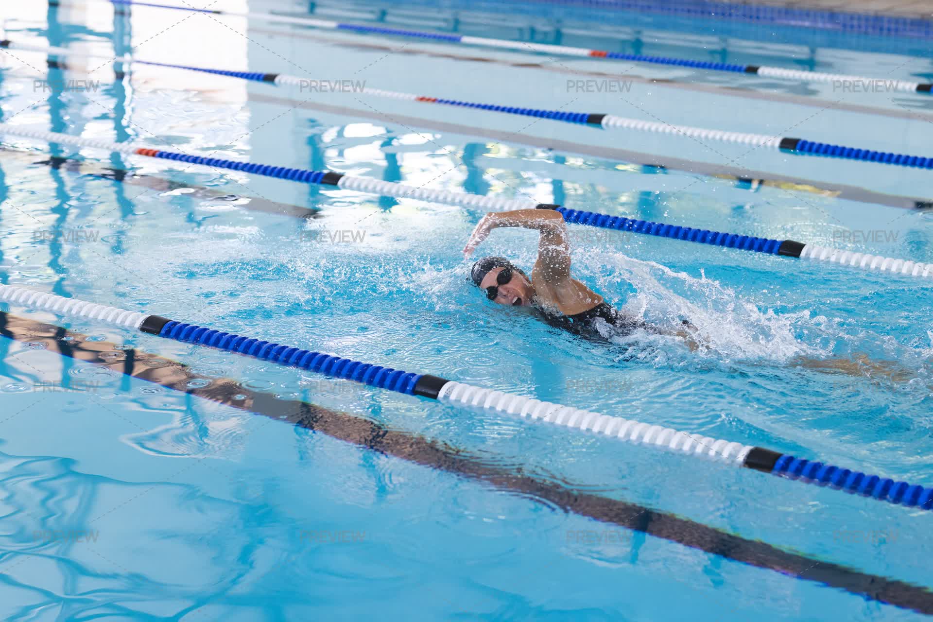 Swimming Ina Pool Person Swimming In An Indoor Pool - Stock Photos | Motion Array
