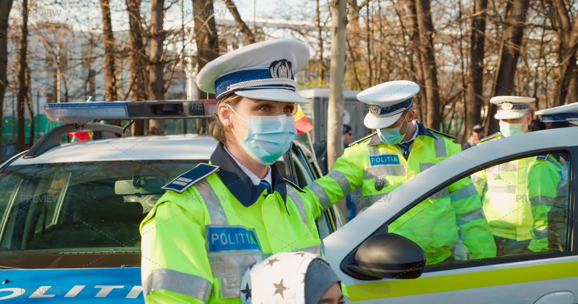 Police Wearing Mask Make Photo With A Child - Stock Photos | Motion Array
