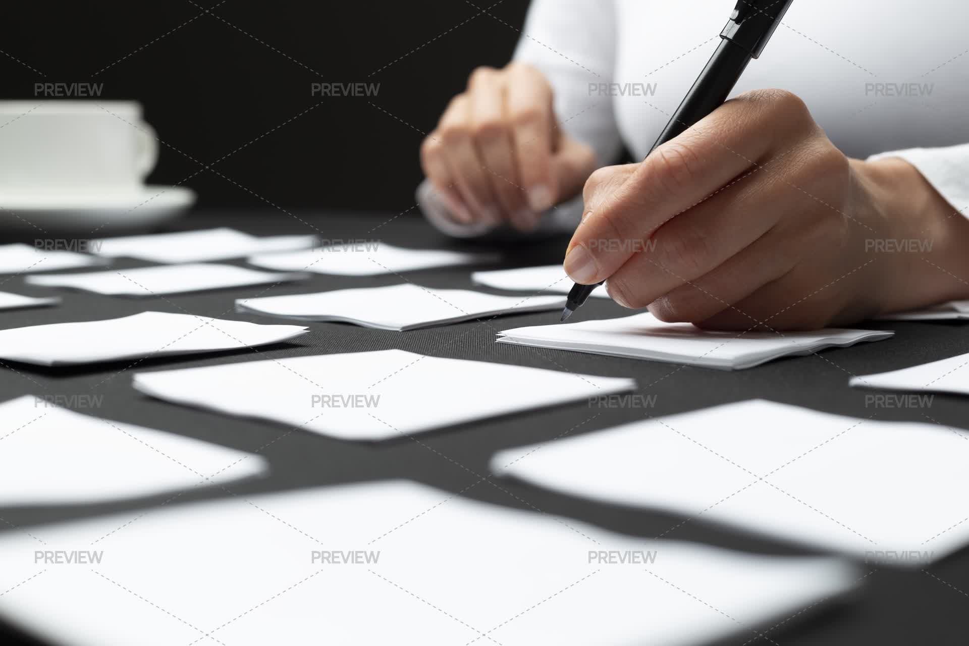 Writing On Sticky Notes - Stock Photos | Motion Array